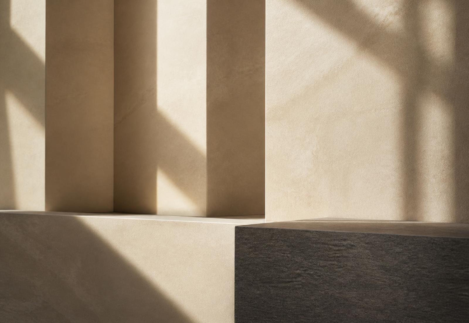 Ivory and graphite architectural surfaces in soft daylight